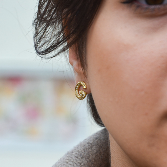 BRINCOS GUESS 'G CRYSTAL' AÇO DOURADO 'JUBE05443JWYGT-U'