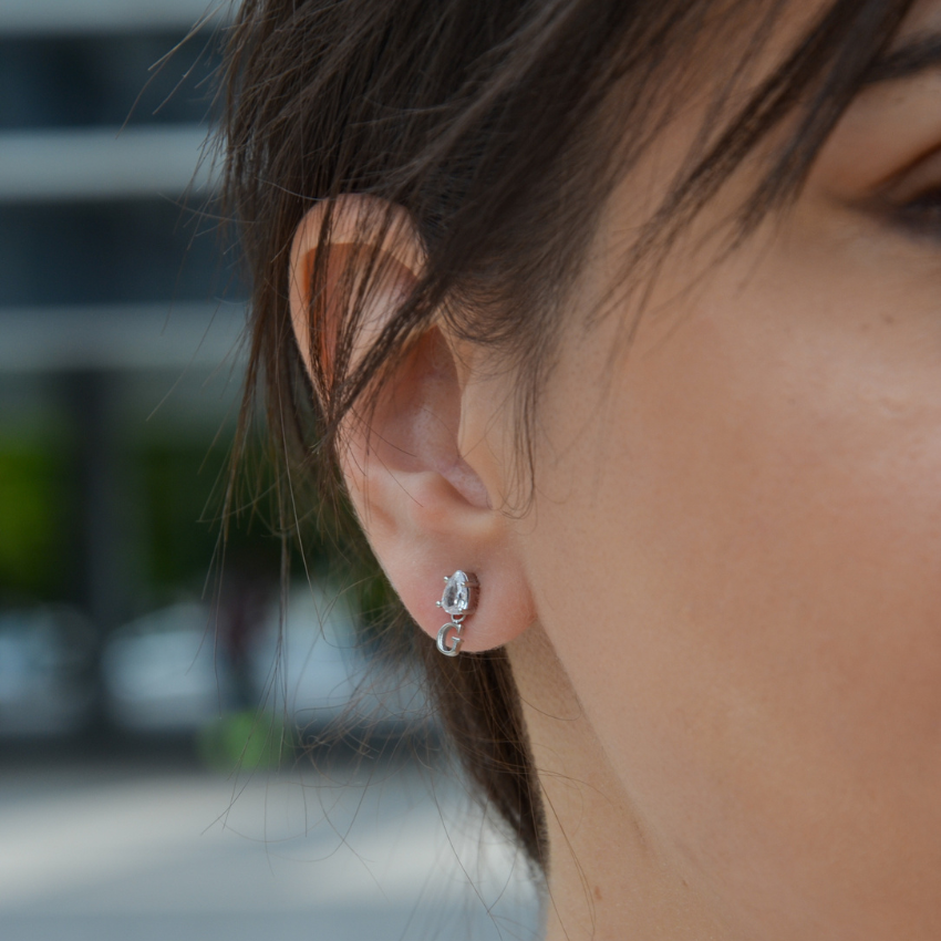BRINCOS GUESS STUDS PARTY AÇO PRATEADO 'JUBE02151JWRHT-U'