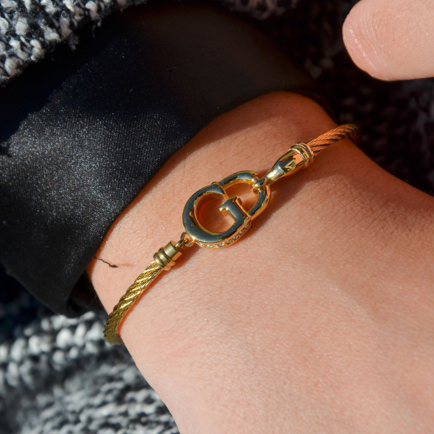 PULSEIRA GUESS 'KALYBE' AÇO DOURADO 'JUBB05399JWYGS'